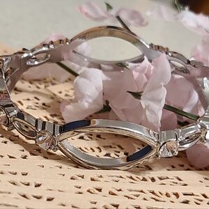 Spring loaded Bracelet silver for sale today
